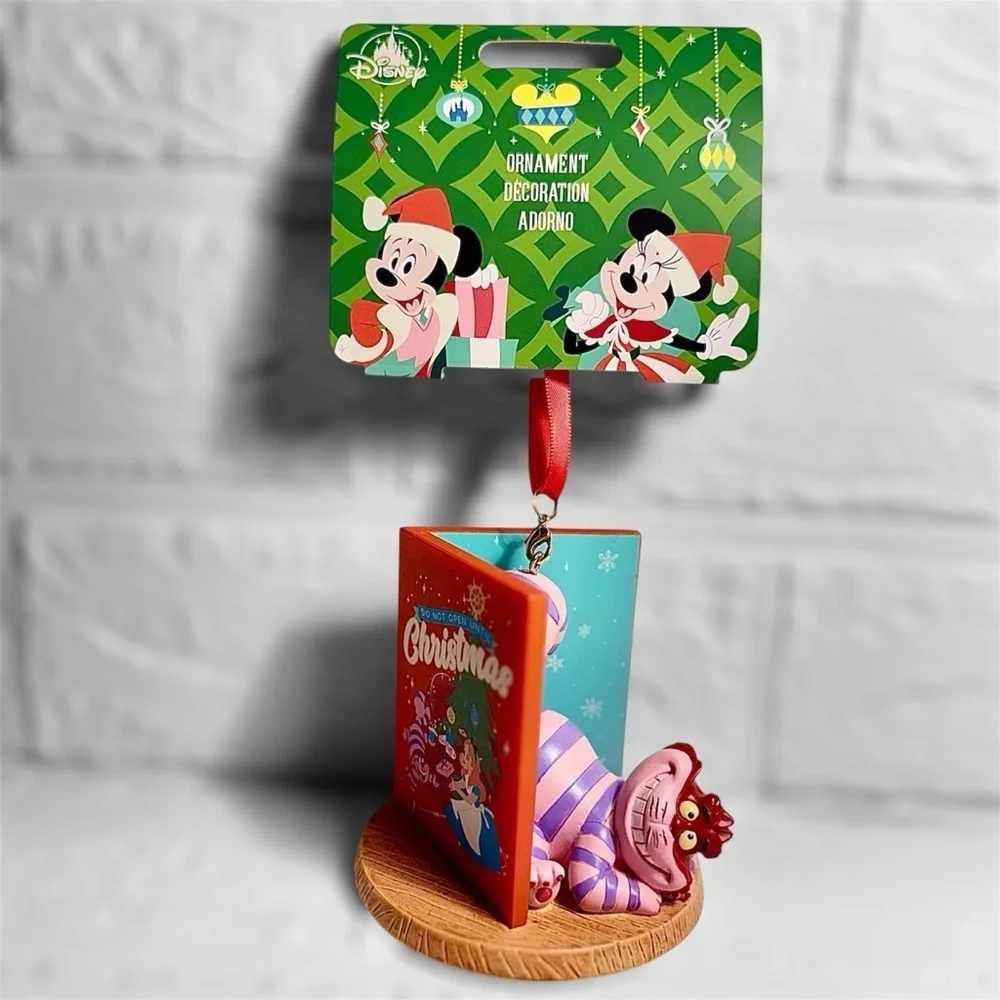 New Disney Cheshire Cat Christmas Ornament in Book Red and Purple